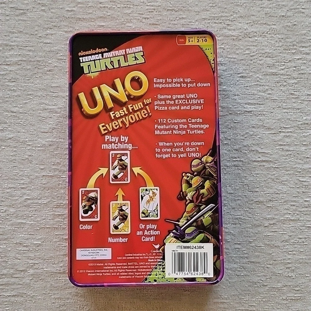 Uno Teenage Mutant Ninja Turles card game in storage tin. Great condition.